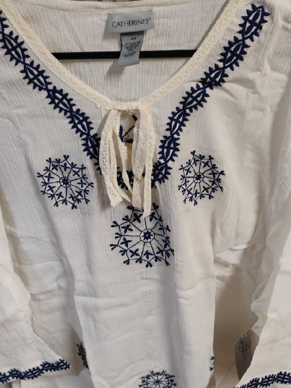 Catherines White Tunic with Navy Blue Embroidery and Tie Neck